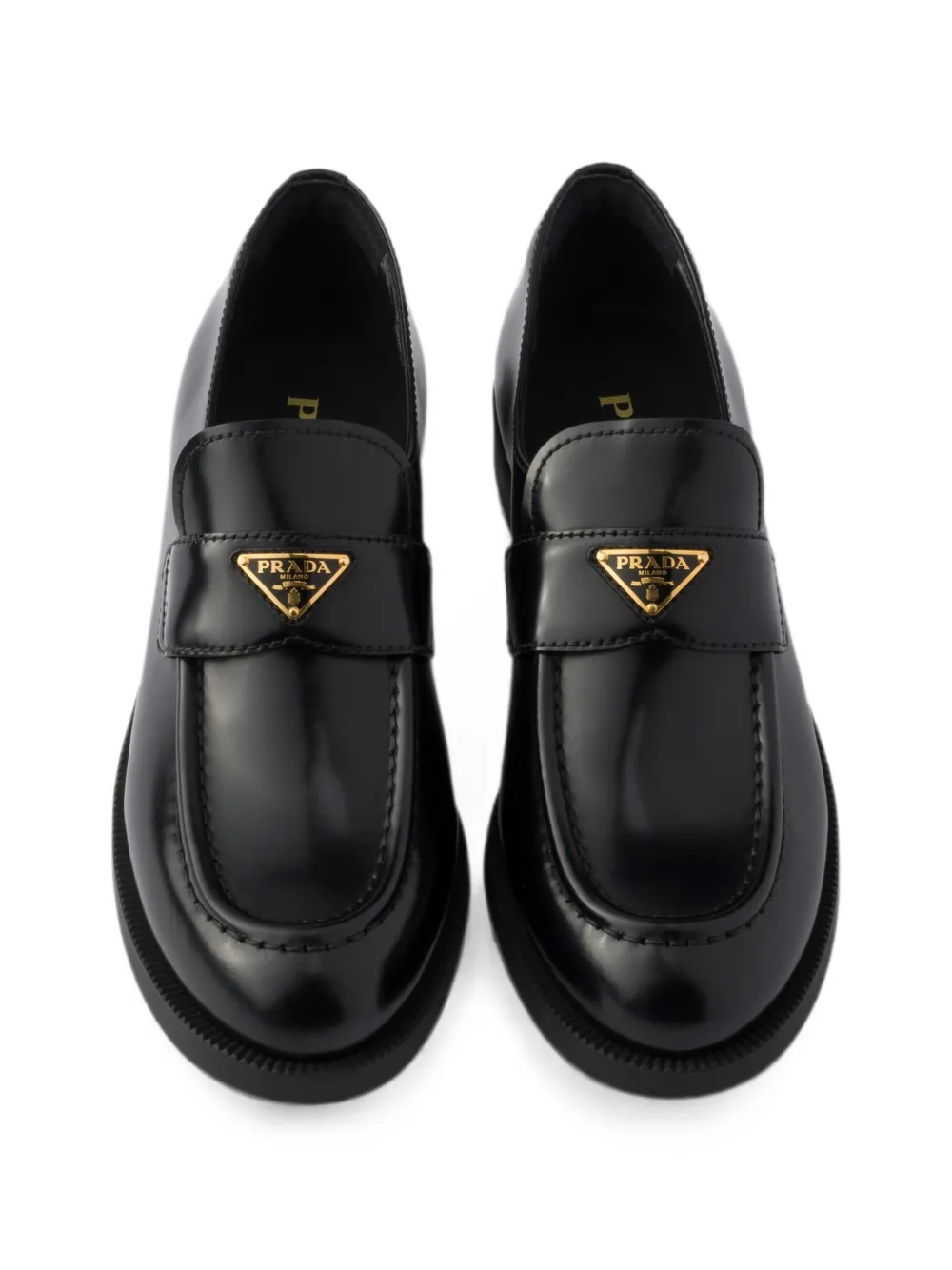 Prada Leren loafers met logo Zwart