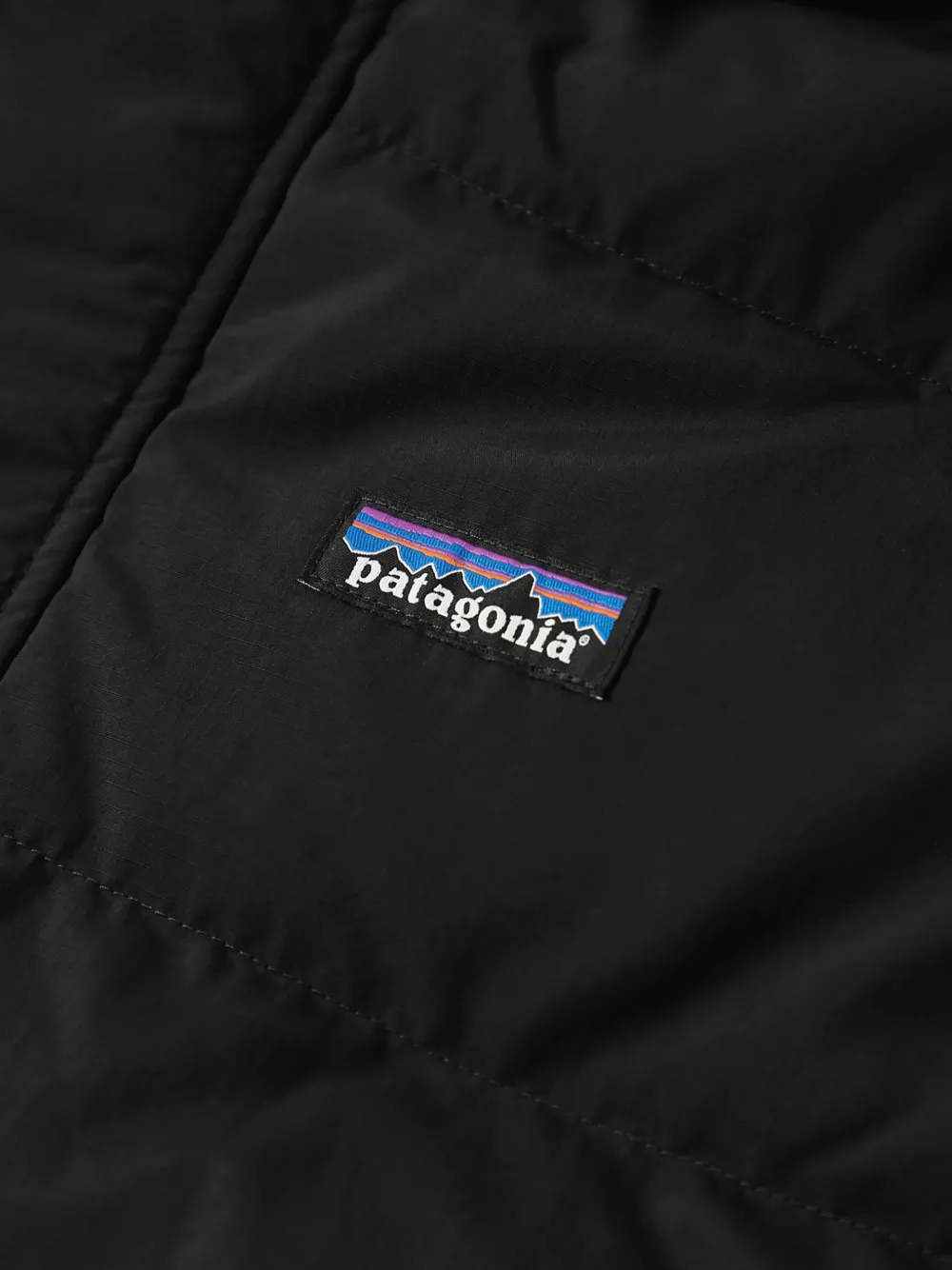 Patagonia quilted hooded jacket Zwart