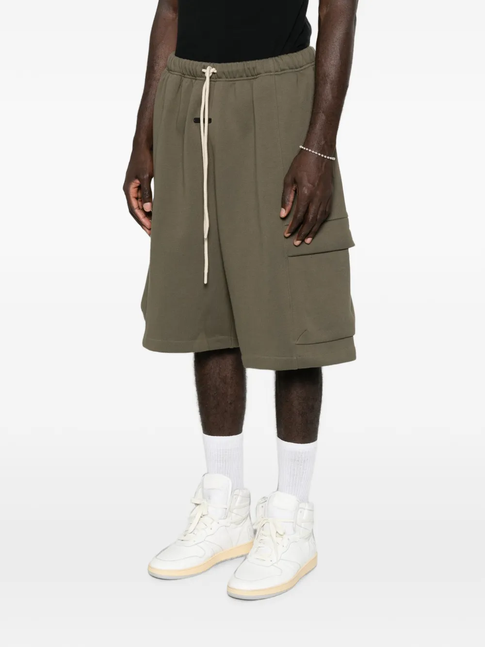 FEAR OF GOD ESSENTIALS fleece cargo basketball short Groen