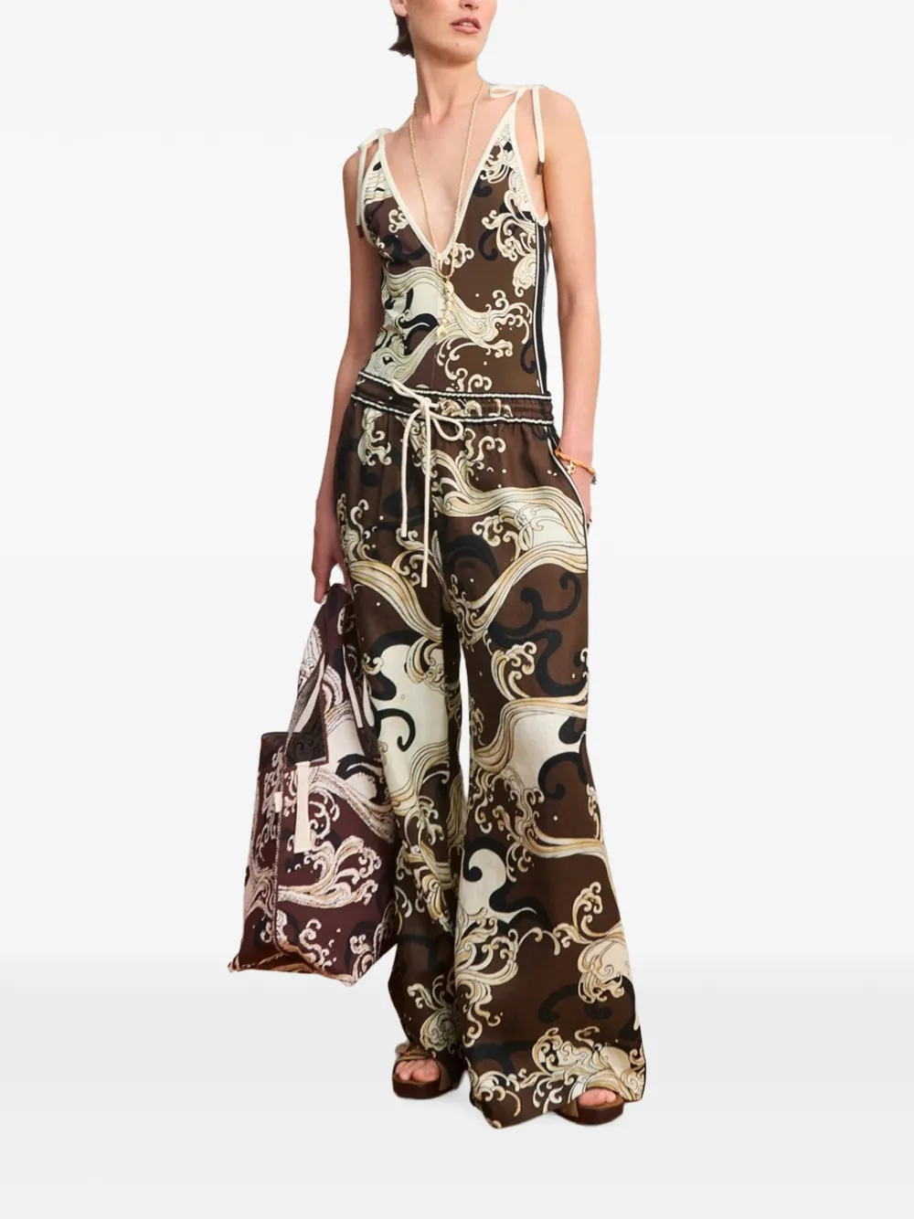 ALEMAIS Otis wave-print trousers Bruin