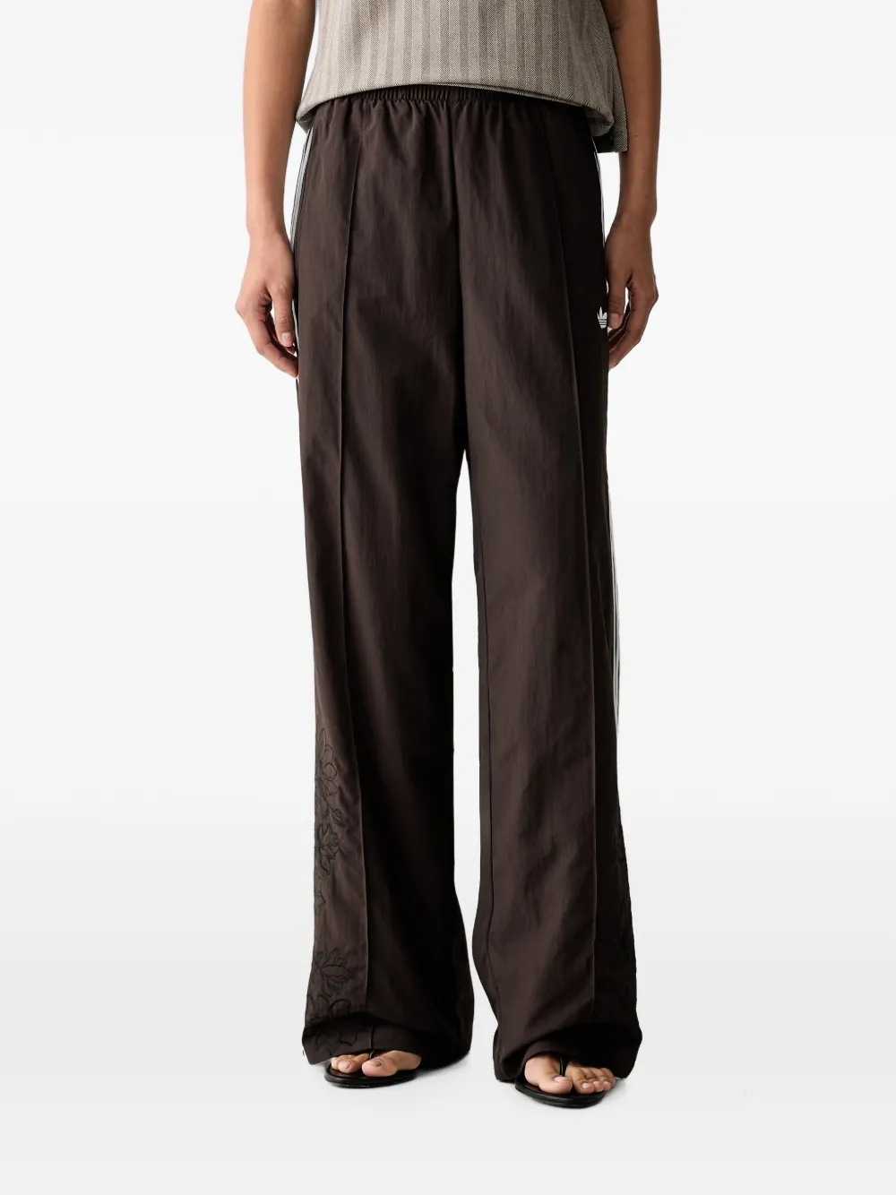 adidas Floral GFX Firebird loose track pants Bruin