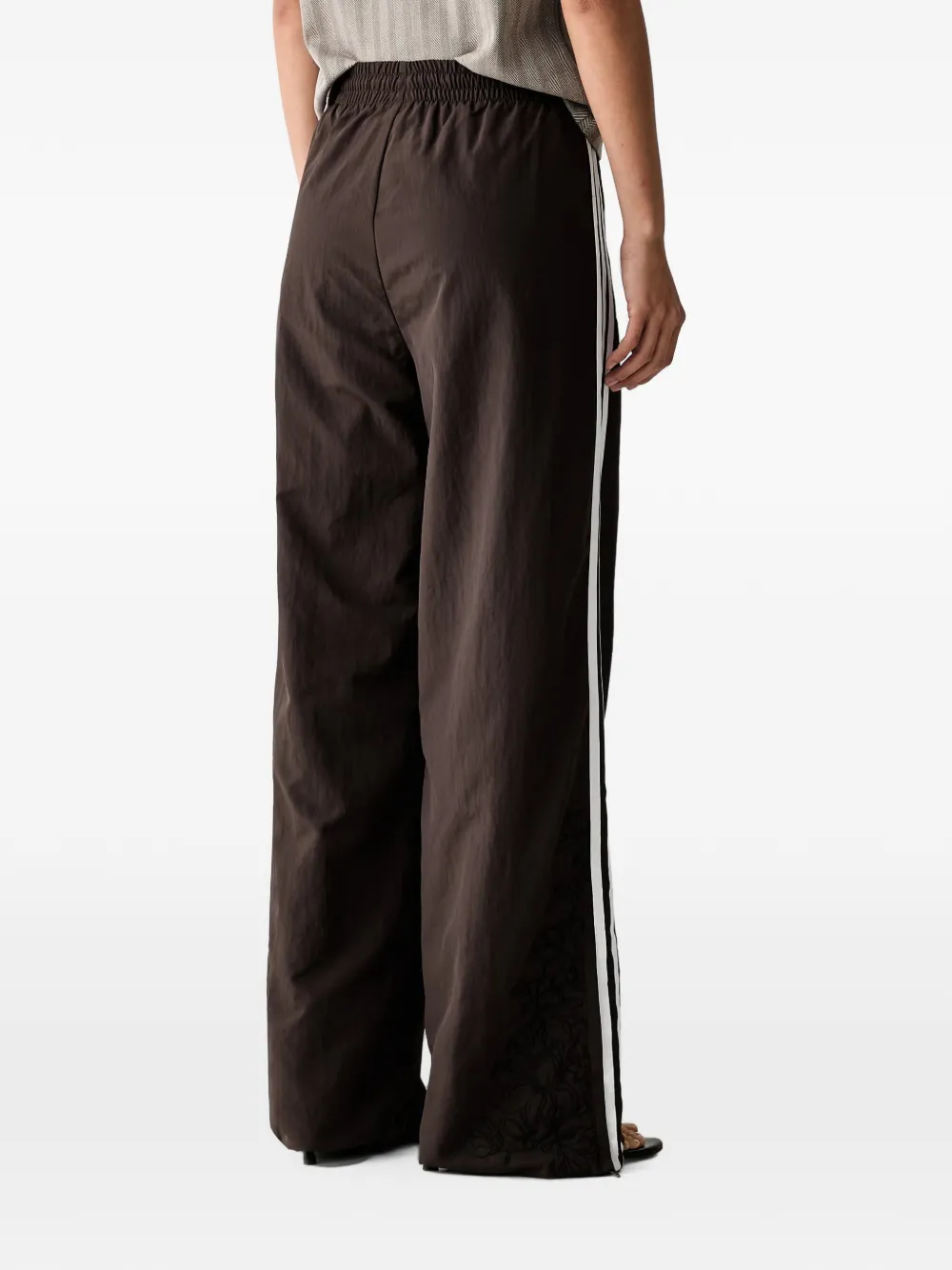 adidas Floral GFX Firebird loose track pants Bruin