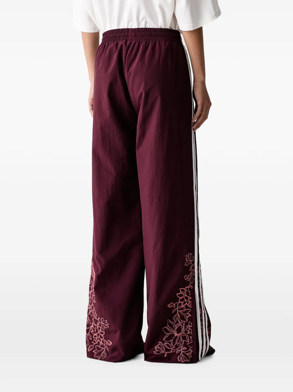 adidas Floral GFX Firebird loose track pants Bruin