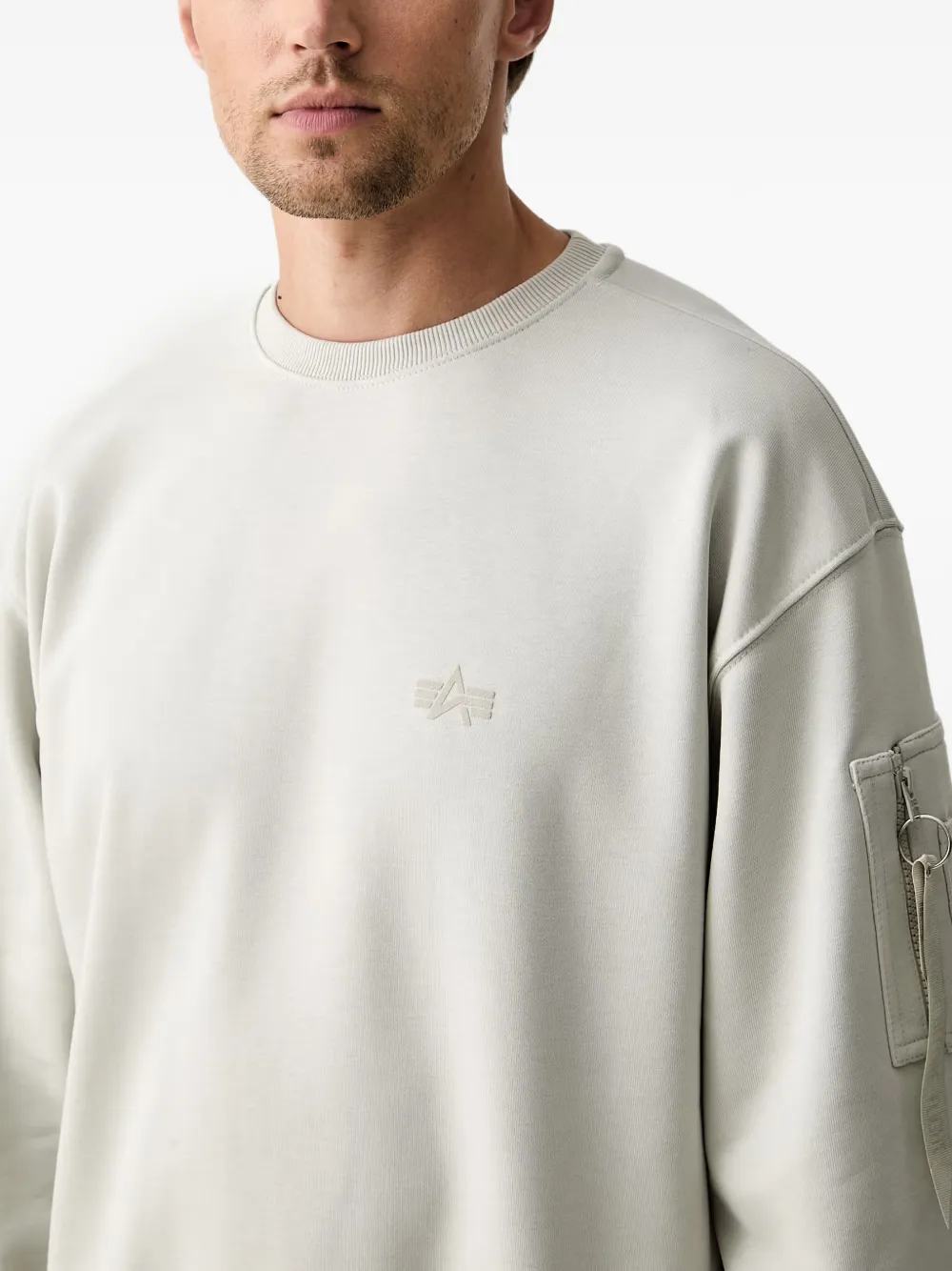 Alpha Industries Sweater met geborduurd logo en ritszak Beige