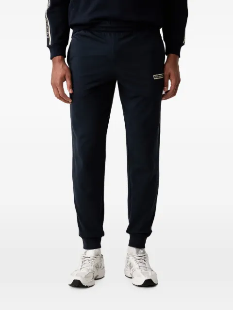 Ea7 Emporio Armani pantalones de chándal con franja del logo