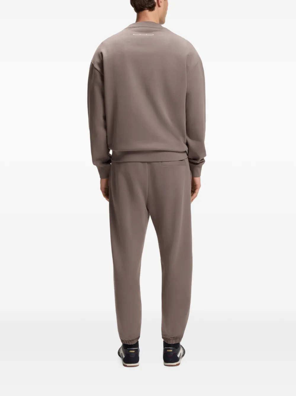 HUGO Ruimvallende katoenen broek met streetwear-logo Bruin