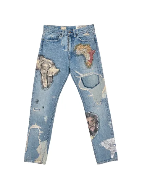 KAPITAL Africa Elements Remake patch-detail jeans