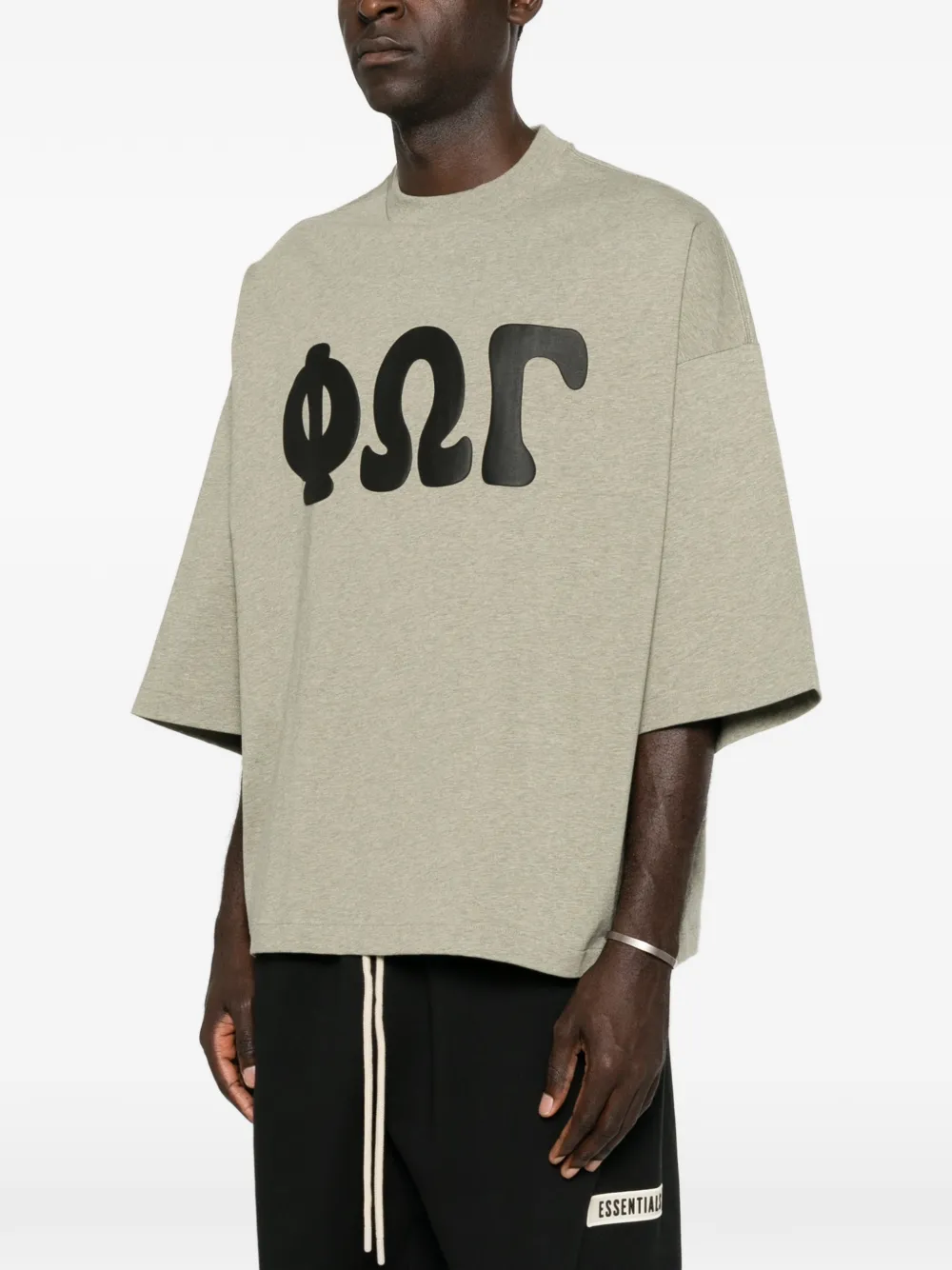 FEAR OF GOD ESSENTIALS Merch boxy-fit T-shirt met grafische print Grijs