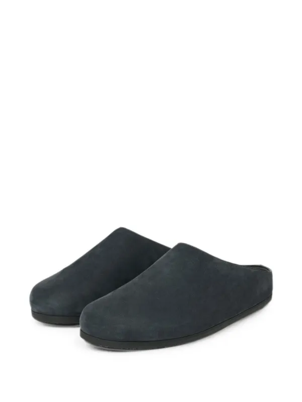 Studio Nicholson Wearing Leather Clogs in Blue