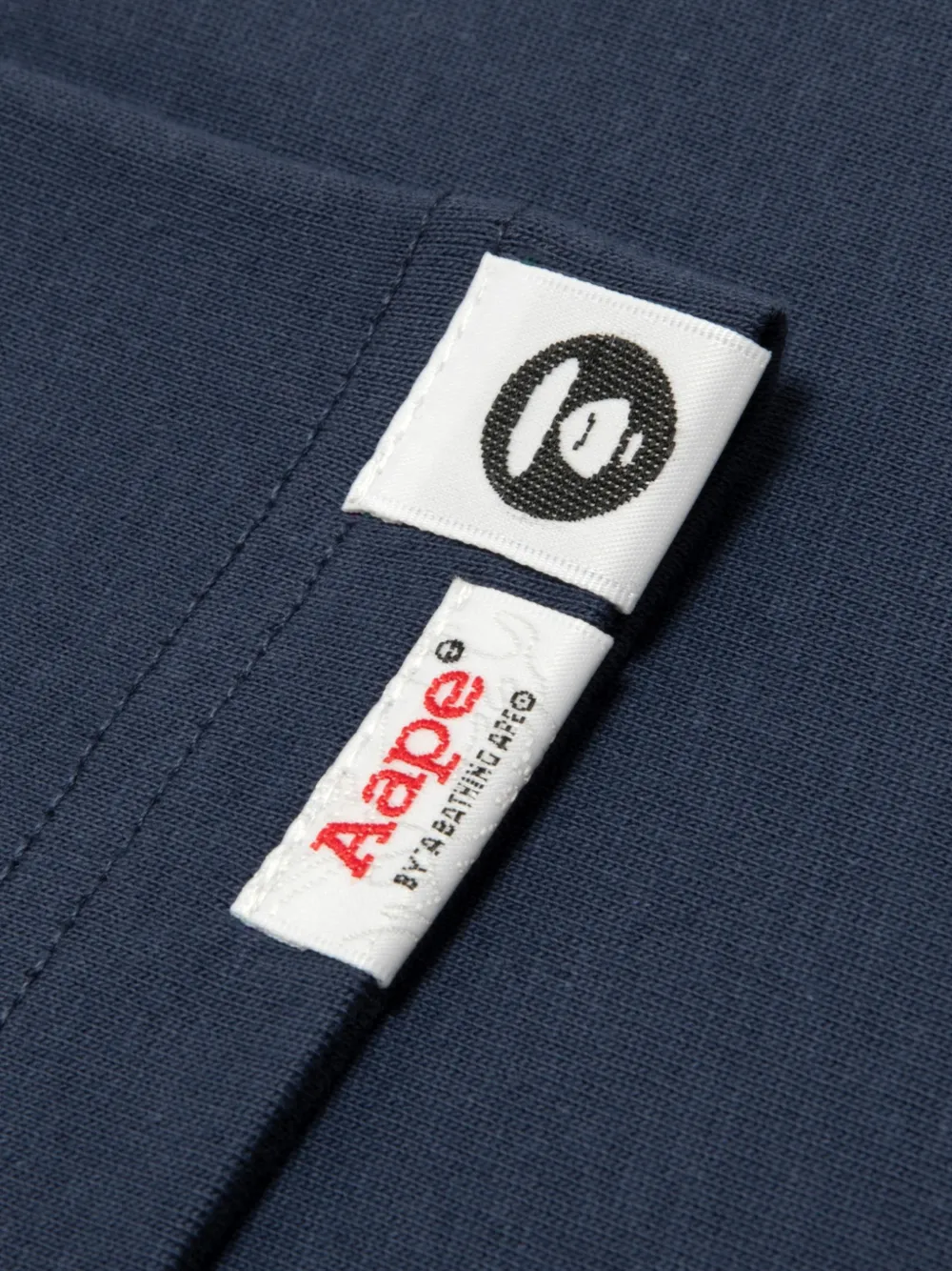AAPE BY *A BATHING APE AAPEUNVS T-shirt met Moonface-print Blauw