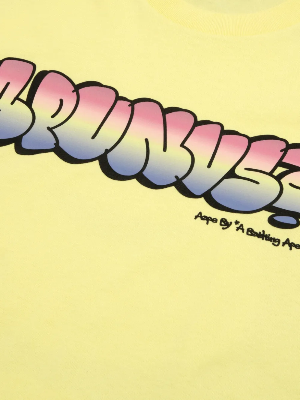 AAPE BY *A BATHING APE AAPEUNVS T-shirt met graffiti-effect en logo-print Geel