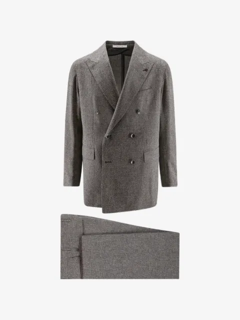 Tagliatore traje con doble botonadura