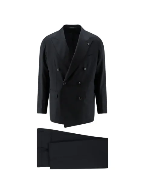 Tagliatore traje con doble botonadura