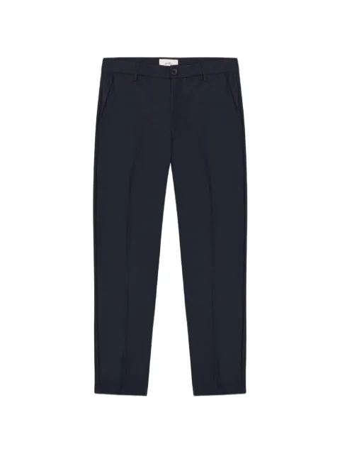 Les Deux pressed-crease slim-fit trousers