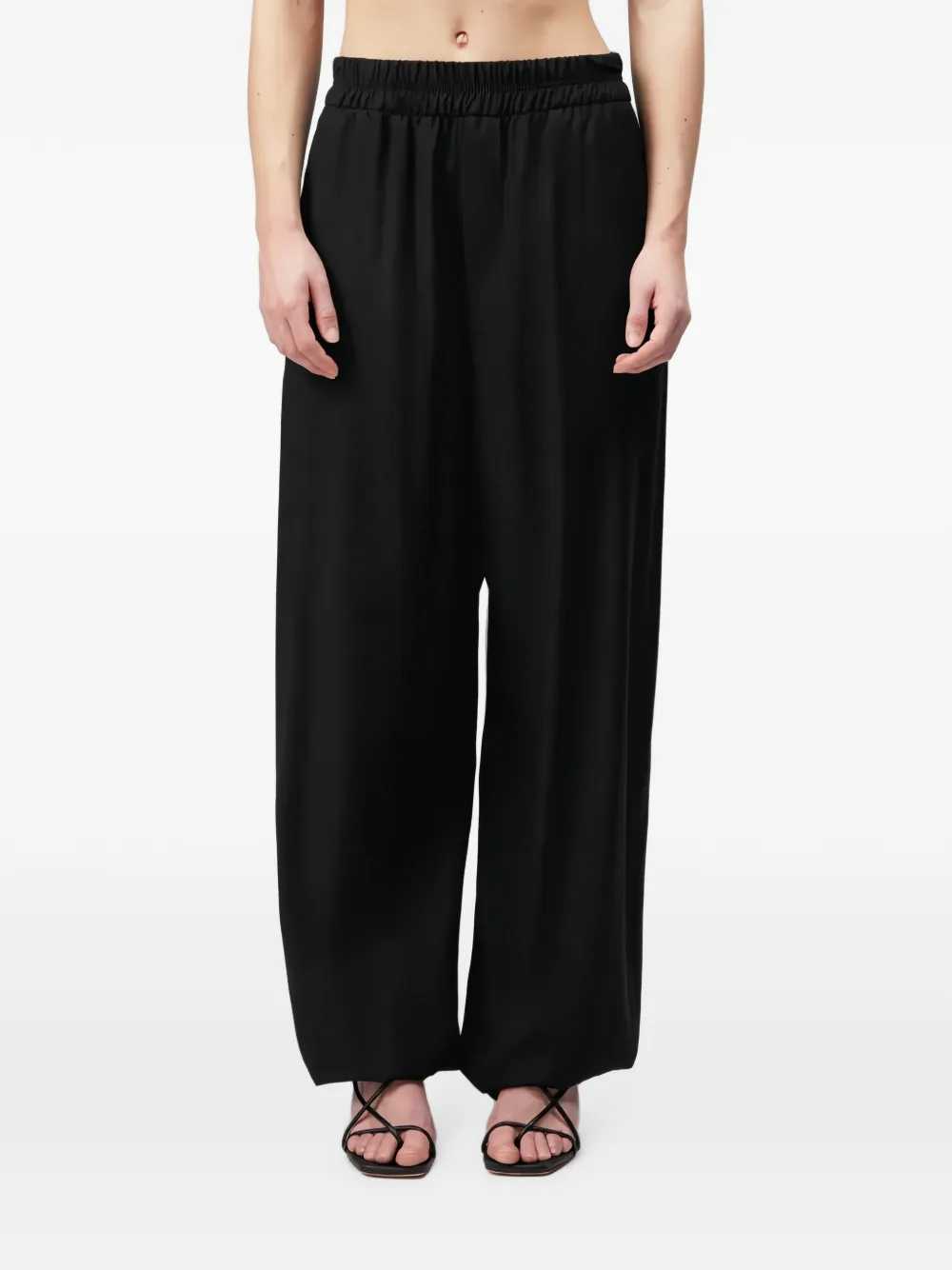 Drykorn Either broek met toelopende pijpen en elastische tailleband Zwart