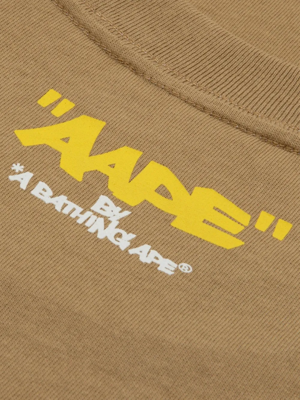 AAPE BY *A BATHING APE AAPENOW T-SHIRT MET GRAFISCHE PRINT Beige