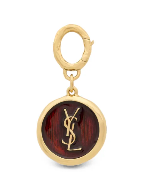 Saint Laurent dije Cassandre en metal y esmalte