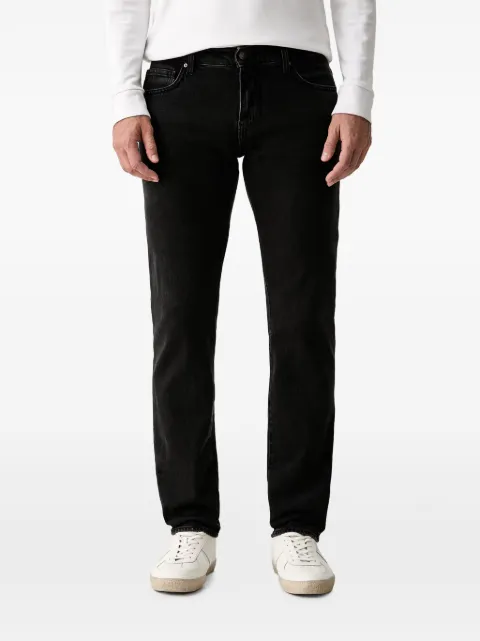 Armani Exchange vaqueros con parche del logo