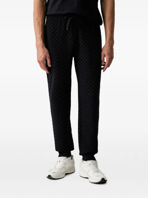 Armani Exchange logo-pattern track pants