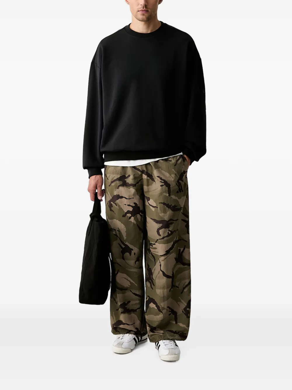 adidas Seasonal Essentials camo woven parachute tracksuit bottoms Groen