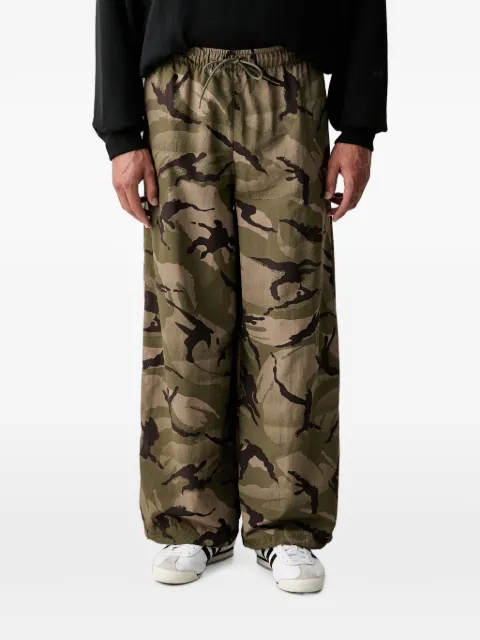 adidas Seasonal Essentials camo woven parachute tracksuit bottoms