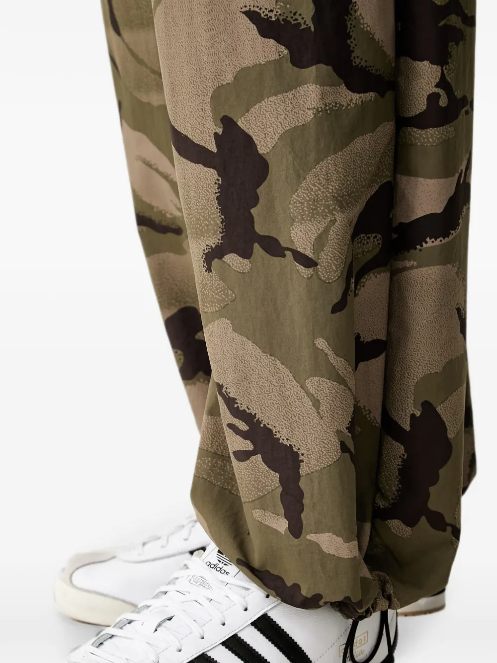 adidas Seasonal Essentials camo woven parachute tracksuit bottoms Groen