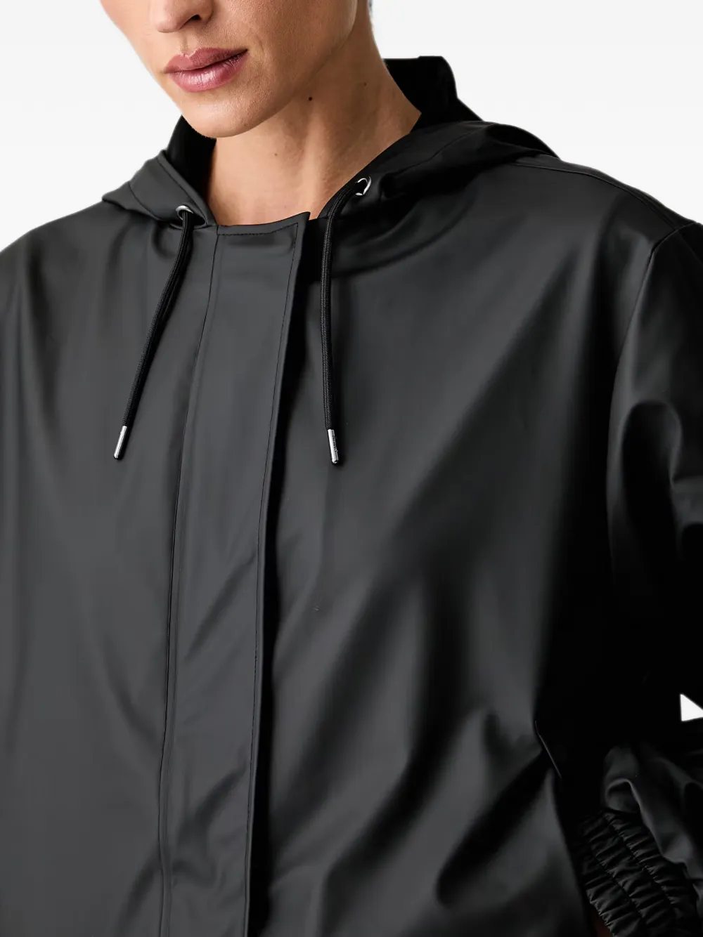 Rains Jack met capuchon en trekkoord Zwart