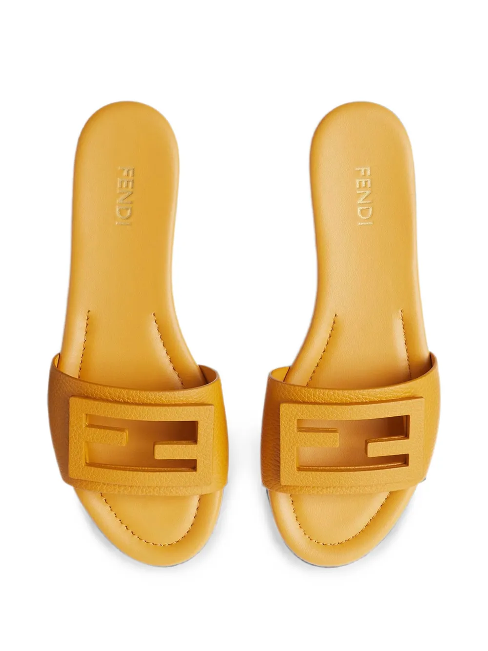 FENDI Baguette yellow leather slides Geel