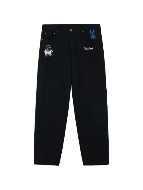Undercover graphic-print jeans