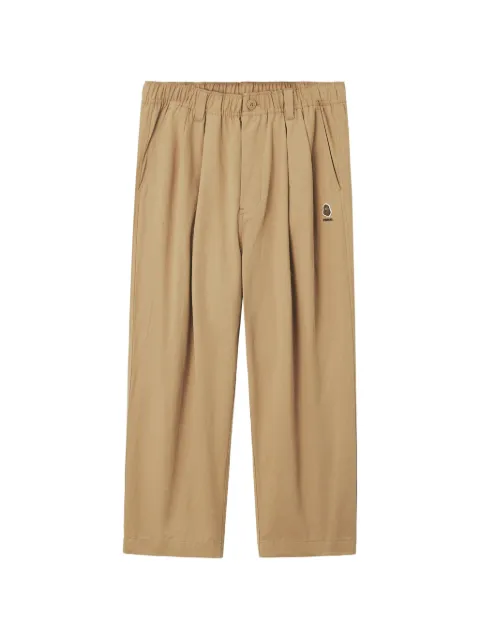 FINGERCROXX logo-patch pleat-detail trousers
