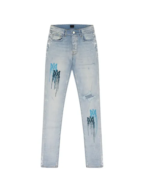 AMIRI logo-print distressed jeans
