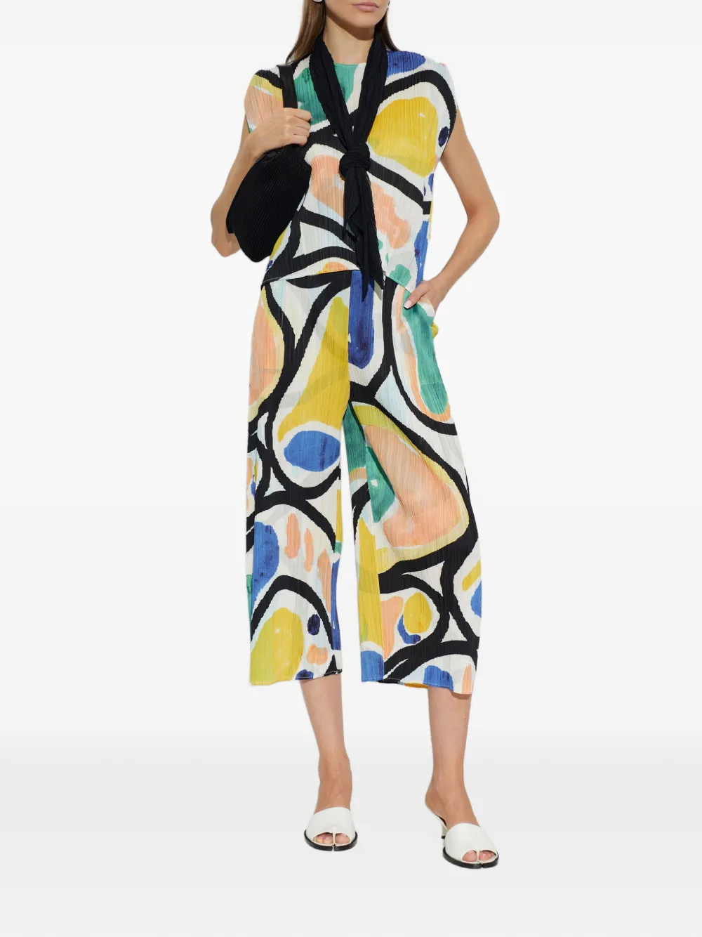 Pleats Please Issey Miyake Roll broek met plissé-effect en abstracte print Beige