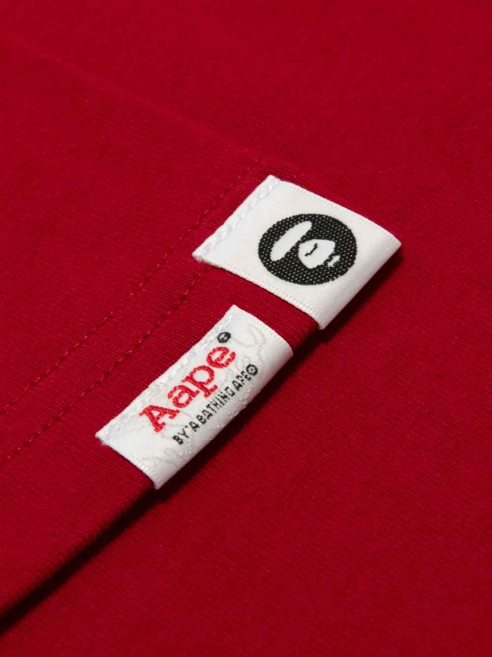 AAPE BY *A BATHING APE T-shirt met Moonface-print en grafische print Rood
