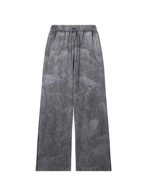 GCDS studded logo-patch track pants
