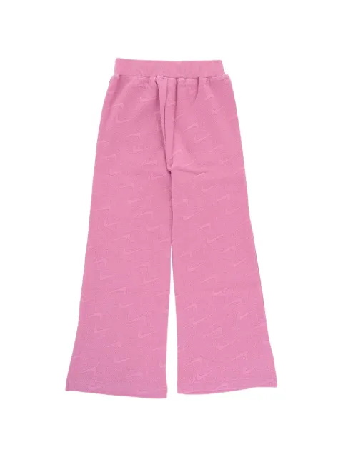 Nike Kids logo-pattern flared track pants