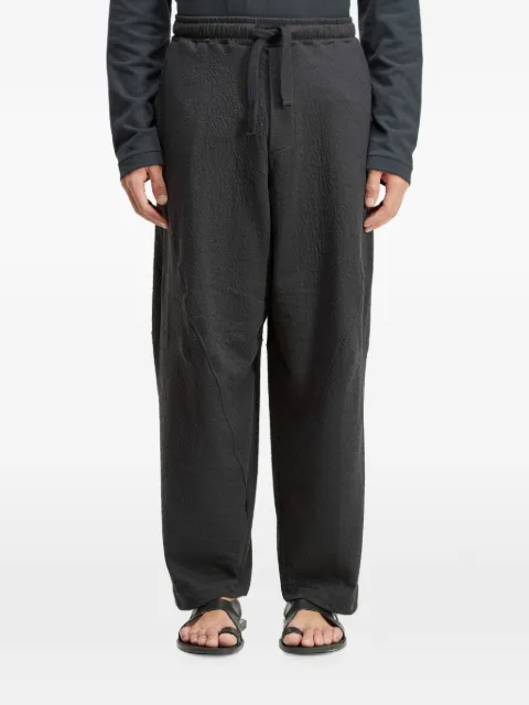 Osklen Calça com efeito amassado e ajuste no cós