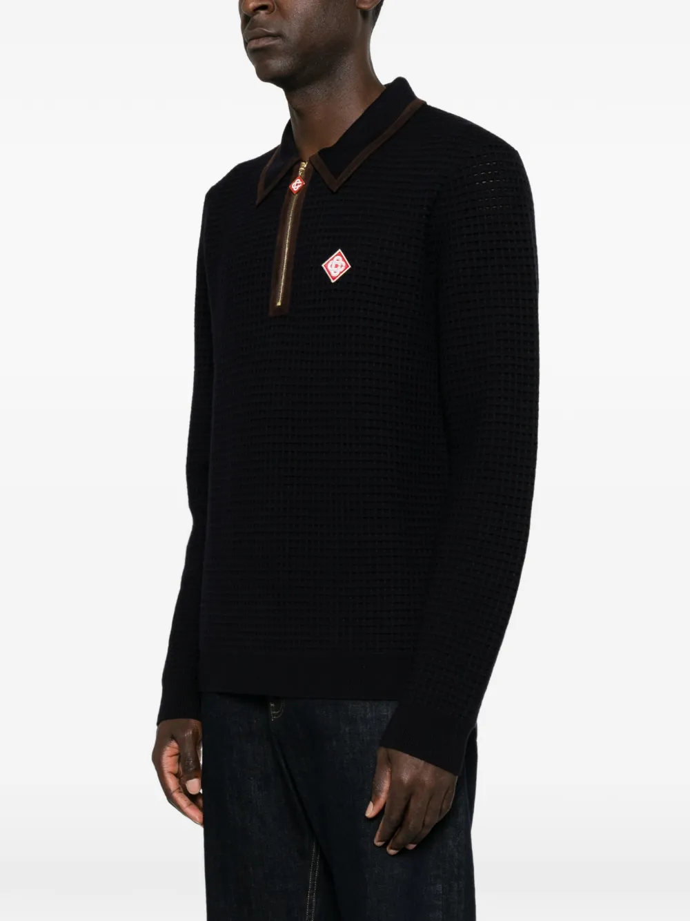 Casablanca Poloshirt van wol met lange mouwen en wafelstiksels Zwart