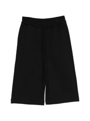 Julius Edge サルエルパンツ | ブラック | FARFETCH JP