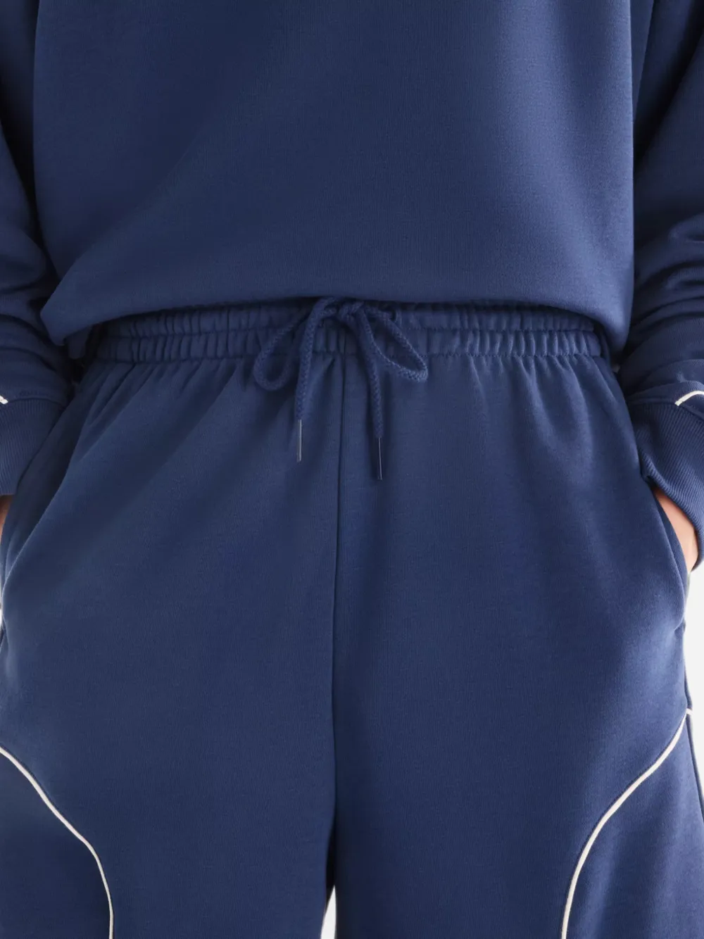 New Balance Trackside badstof shorts Blauw