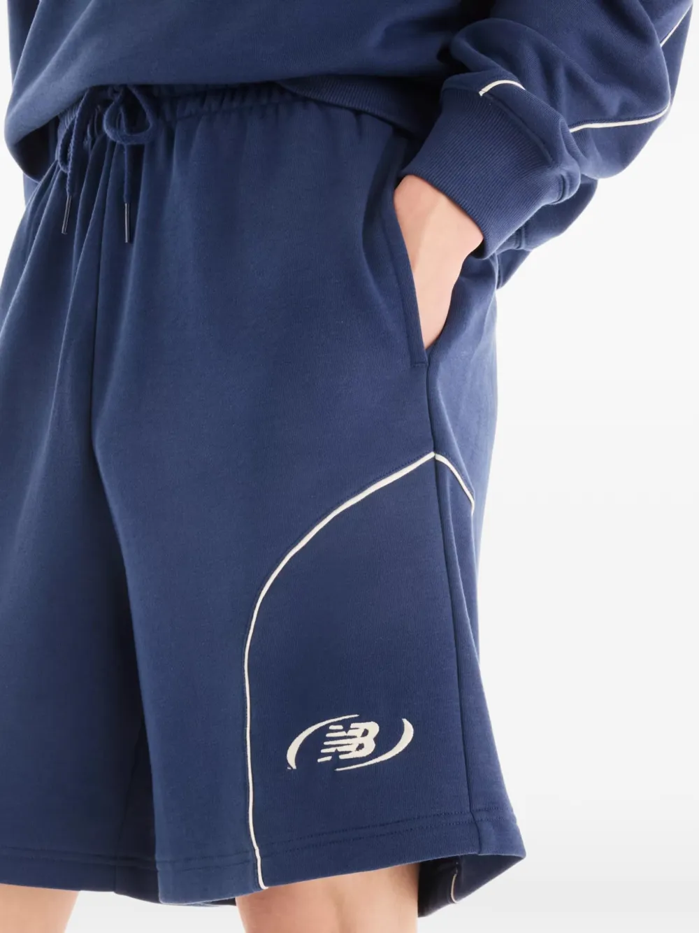 New Balance Trackside badstof shorts Blauw
