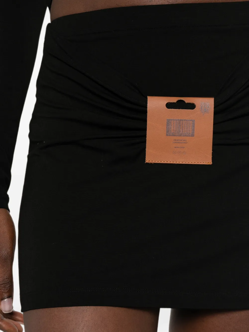 Jean Paul Gaultier Gesmockte mini-rok met logo-patch Zwart