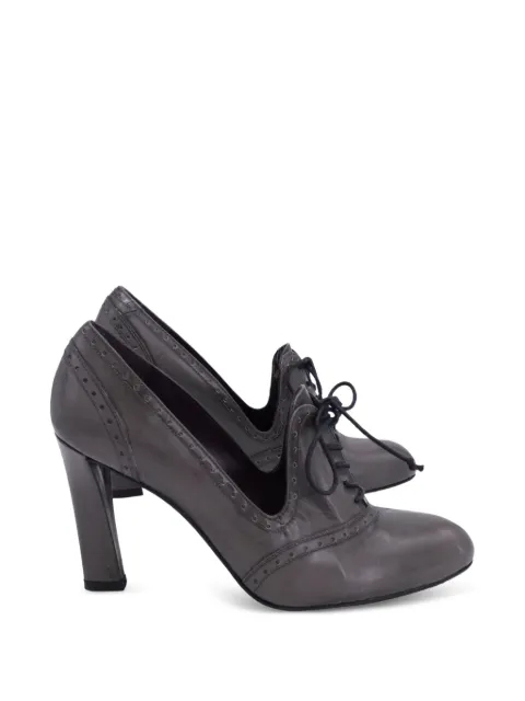 Stuart Weitzman lace-up wingtip pumps