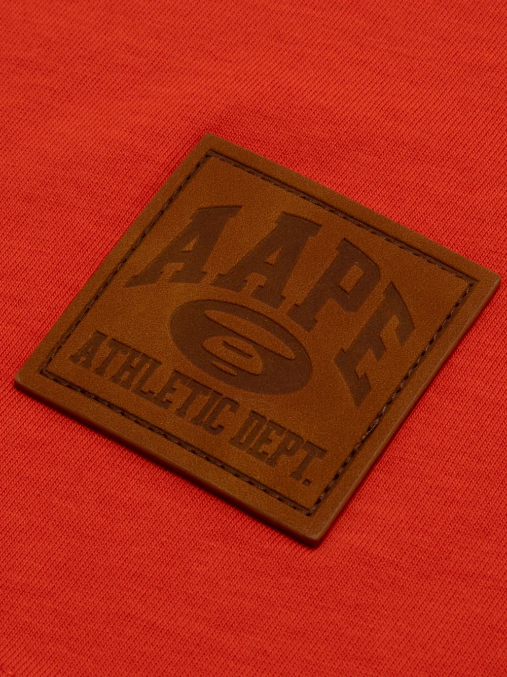 AAPE BY *A BATHING APE T-shirt met logopatch Oranje