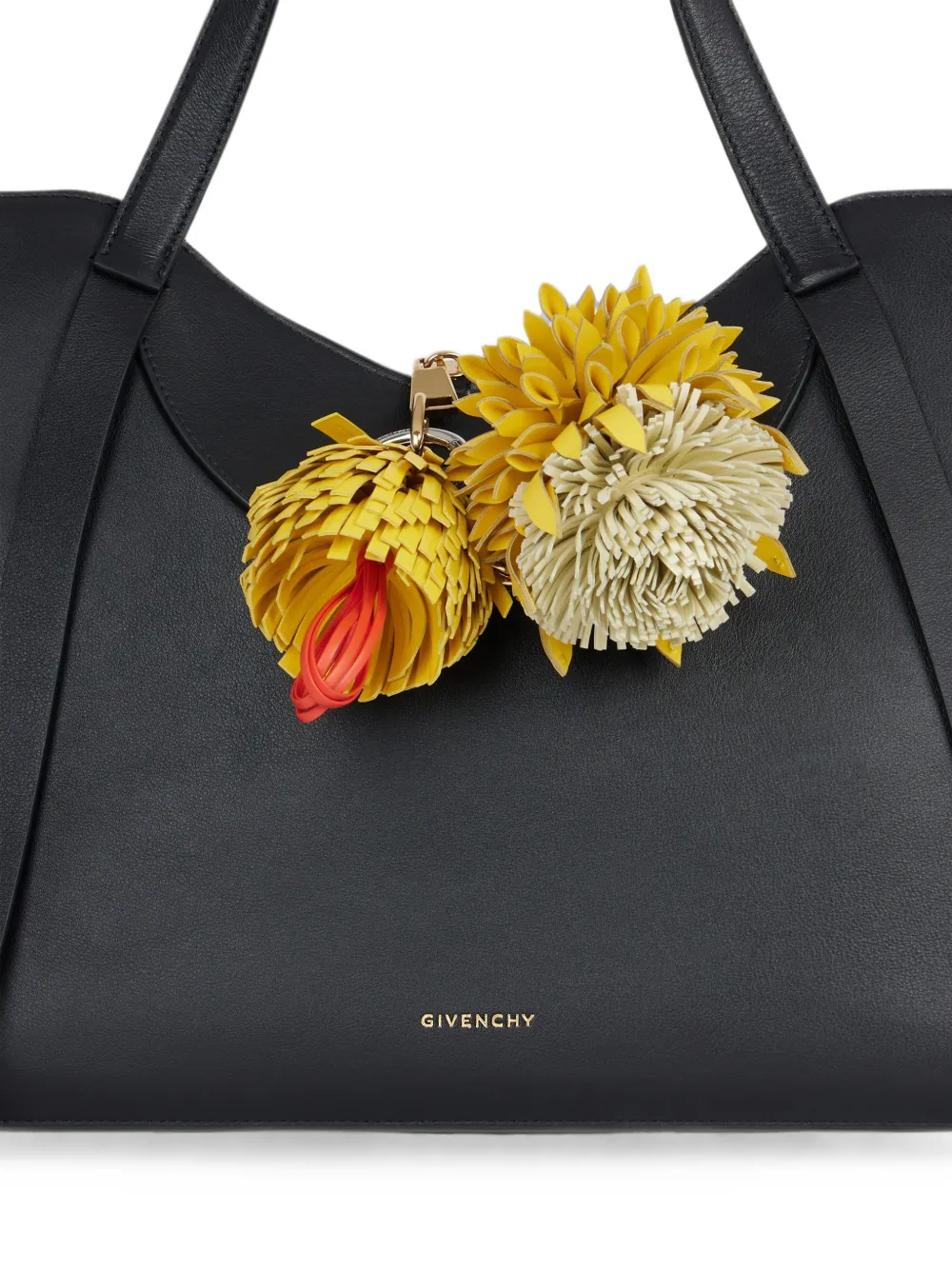 Givenchy Tweekleurige nappaleren madeliefjes-bedel Zwart