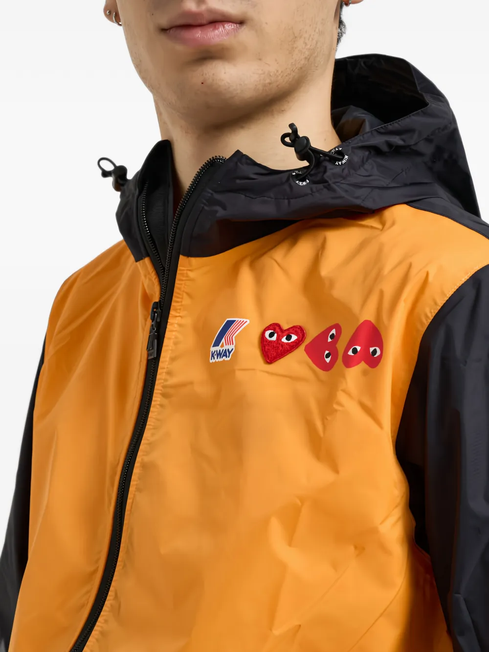 Comme Des Garçons Play x K-Way Claude jack met colourblocking en hart-patch Oranje