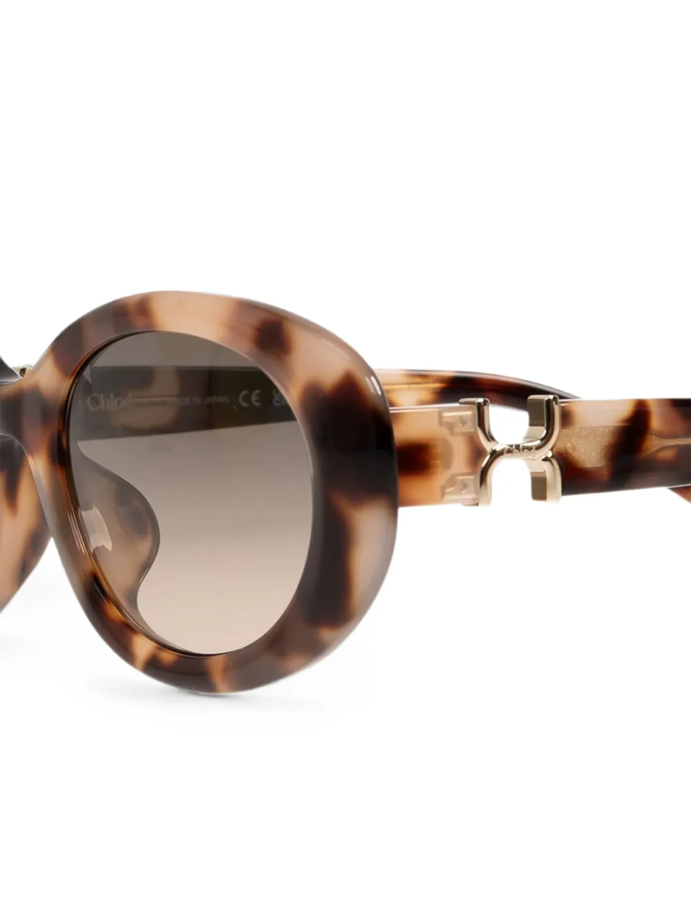 Chloé Eyewear Marcie zonnebril met ovalen montuur en schildpadschild design Bruin