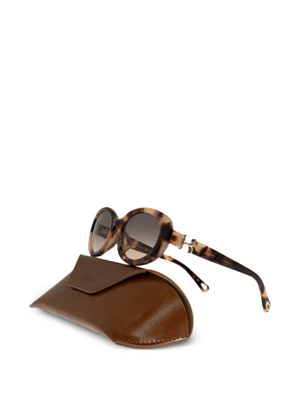 Chloé Eyewear Marcie zonnebril met ovalen montuur en schildpadschild design Bruin