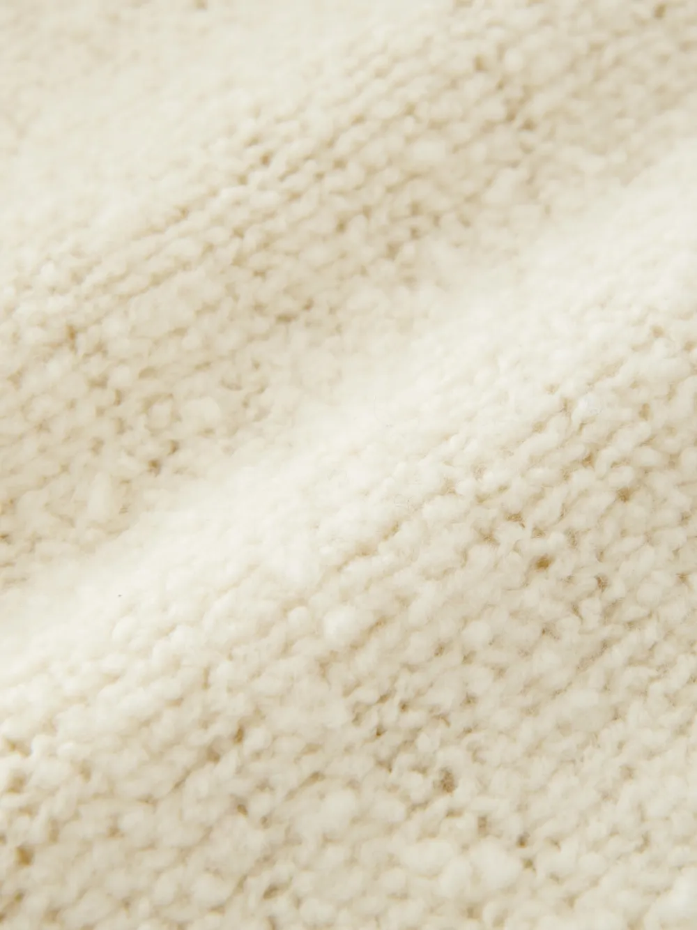 Studio Nicholson Maele bouclé gebreide trui Beige