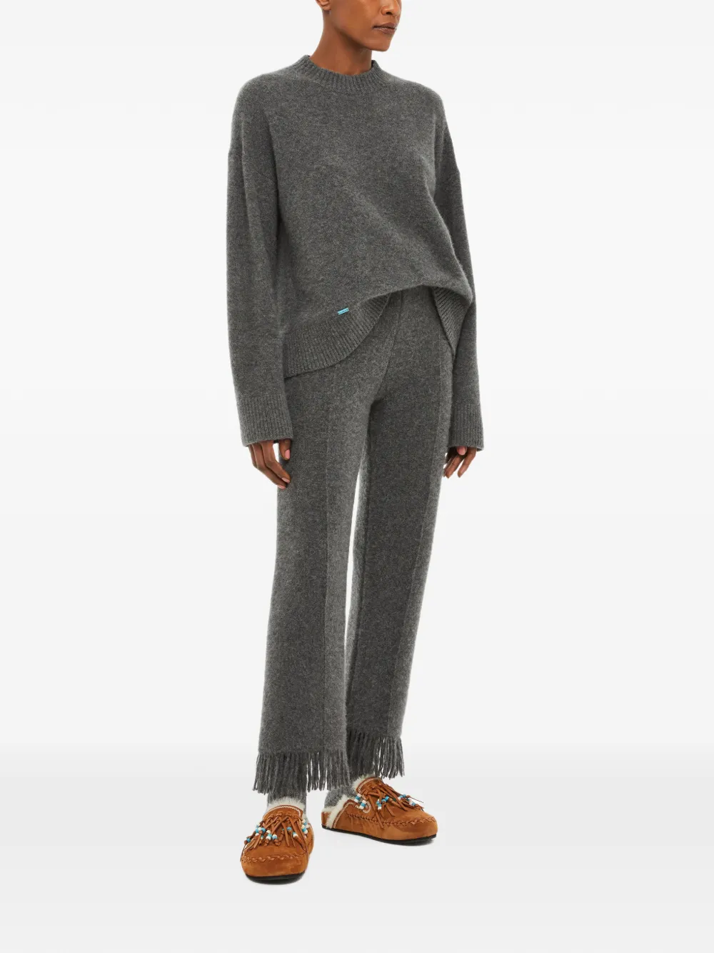 Alanui fringe-trim trousers Grijs