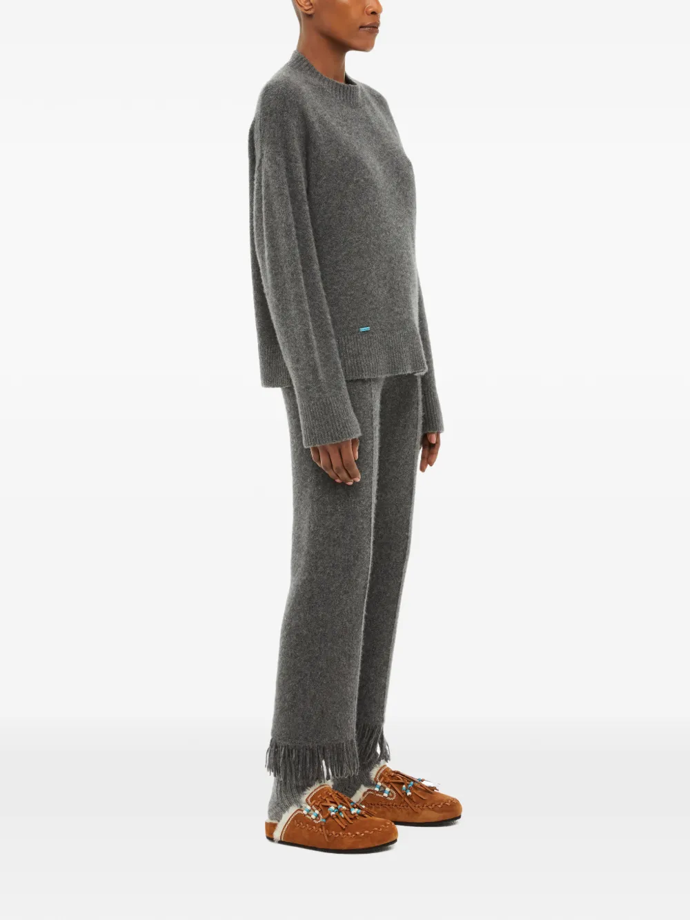 Alanui fringe-trim trousers Grijs